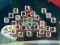 Гульня Among Mahjong Tiles онлайн